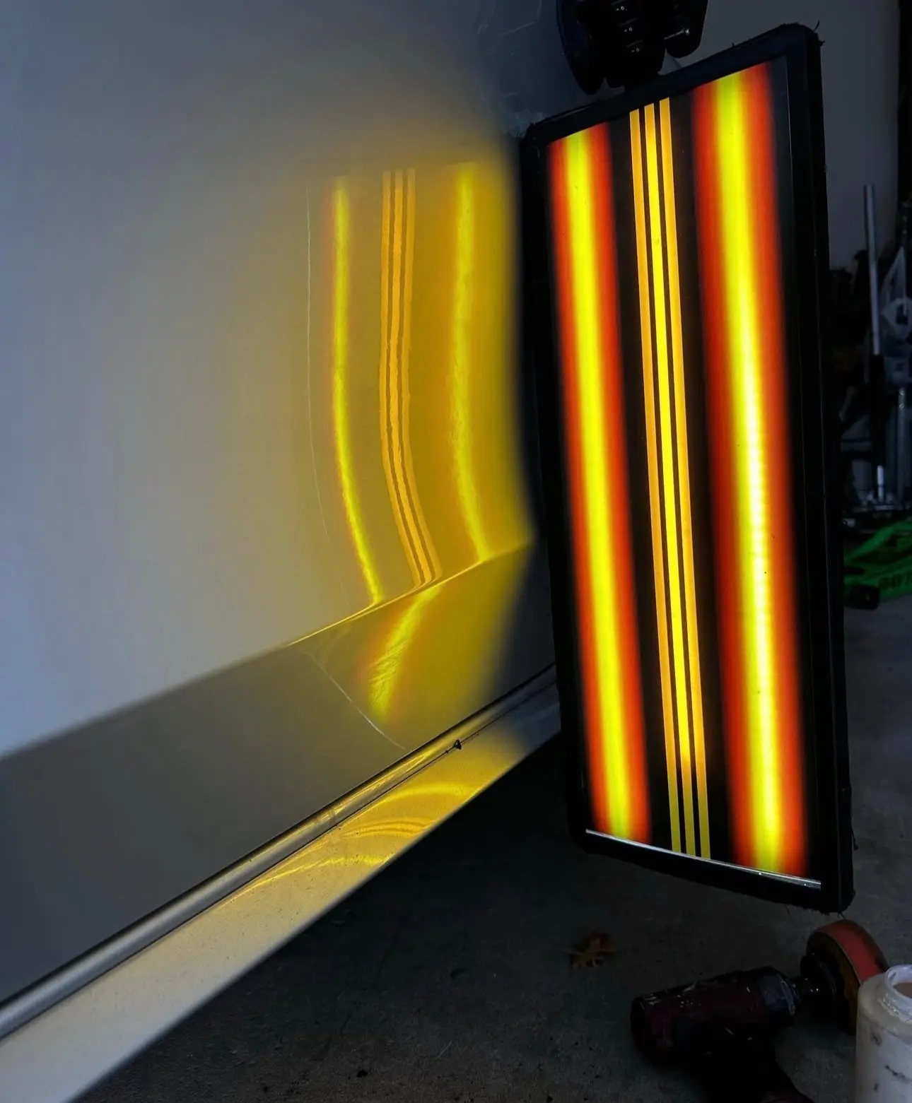 car door dent being fixed with paintless dent repair